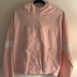 Pink windbreaker with white stripes